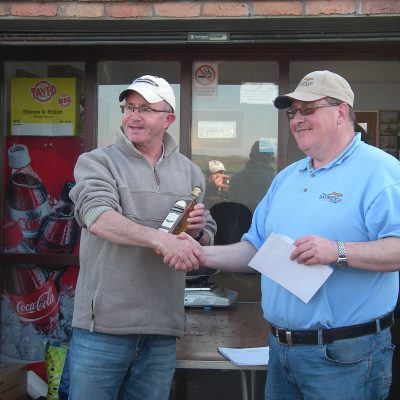 BAC Friendship Cup Corbet Lough 8 April 2017 Martin Dynes presents Aidan Donnelly with a prize for being the Armagh Club's top rod