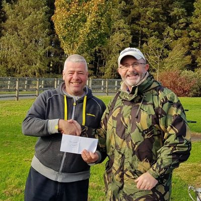 BAC Friendship Cup 2018 at Seaghan Dam on 29 September 2018 - Aidan Donnelly presents Frank Kearney with the Heaviest Bag Prize