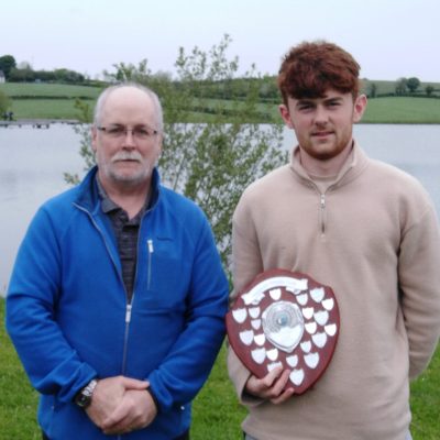 BAC - Sam Watt presents Patrick Curran with the Juvenile Angler of the Year Shield 2019 at the Corbet Lough on Thursday 27 May 2021