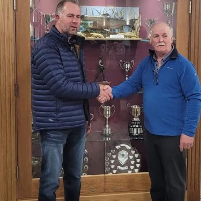 BAC - Prize Distribution Evening 26 May 2022. Roger McClements Adult Angler of the Year 2021 is congratulated by Sam Watt, Club Chairman