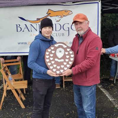 BAC - Joe Curran presents Kevin Conwell with the Adult Angler of the Year Shield for 2023 at the Corbet Lough on 13 June 2024