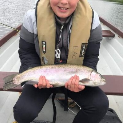 BAC - Juvenile angler Riley Craig with 6lbs Rainbow caught and released at the Corbet Lough on 17 June 2024