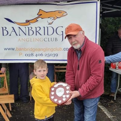 BAC - Joe Curran presents Xavier Mackle with the Junior Angler of the Year Shield for 2023 at the Corbet Lough on 13 June 2024