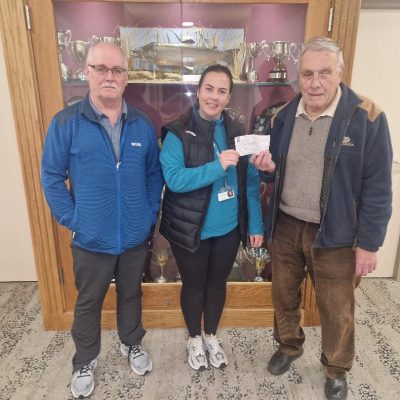 BAC - Joe McCandless and Sam Watt present £400 to Cancer Focus NI