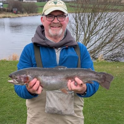 BAC - Geoff Hylands with a great over-wintered Rainbow of over 5lbs caught at the Corbet Lough on 6 March 2025