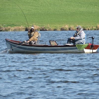 BAC - Boat angler into a fish at Corbet Lough during April 2025