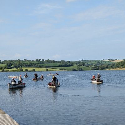 BAC - Anglers heading out from the jetty to fish in the Boat Anglers Cup competition at the Corbet Lough on 21 June 2025