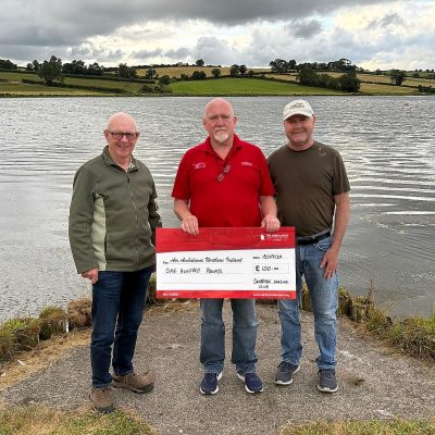 BAC - Eugene Curran and Brendan Downey present a cheque for £100 to Air Ambulance NI from monies raised by the Club's Competition anglers during the 2024 season. 