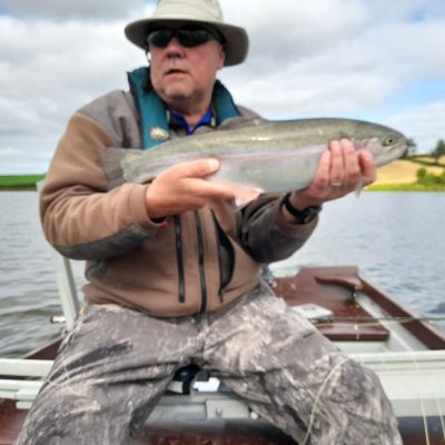 BAC - Keith Moffitt with a 7lbs 1ozs Rainbow Trout caught whilst fly fishing from the boat at the Corbet Lough on 2 August 2025